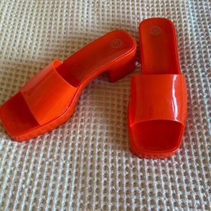 Never been worn Orange/Coral color small heeled sandals